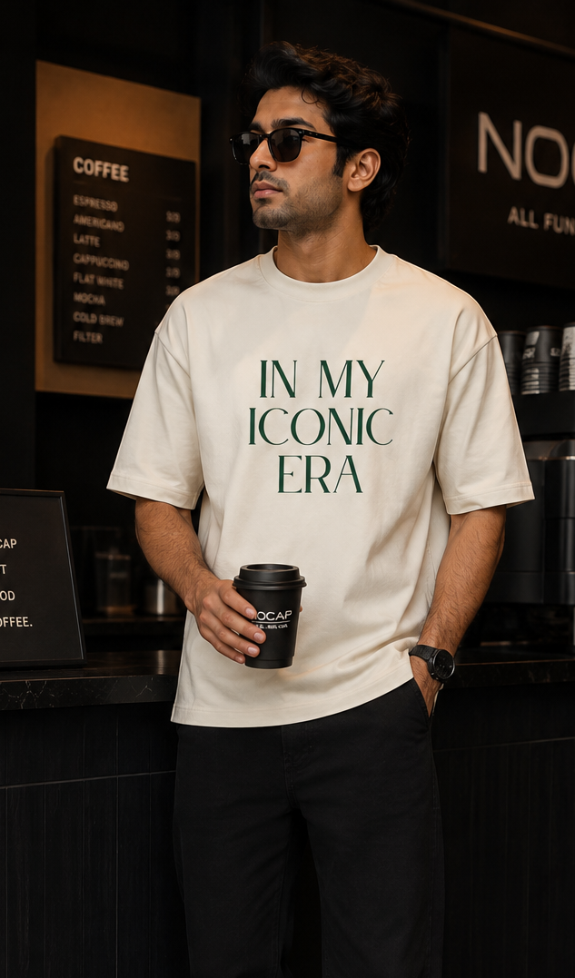 Model wearing the cream In My Iconic Era oversized terry tee